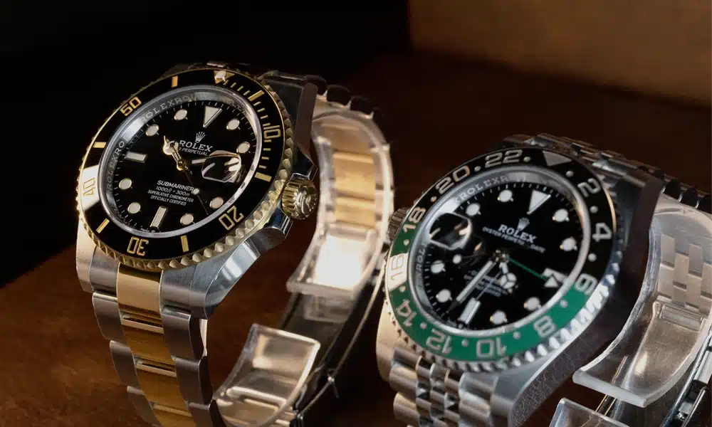 a couple of watches on a shelf