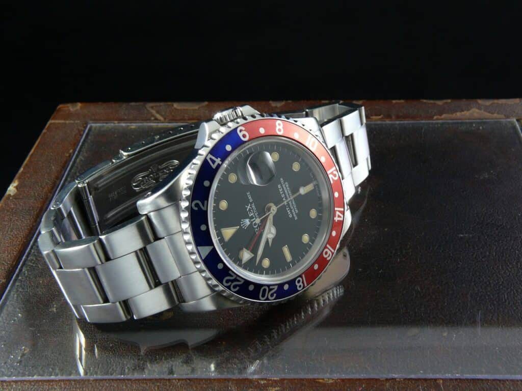 Rolex Coke Watch GTM Master II watch with red and blue bezel and black dial. Oystersteel bracelet